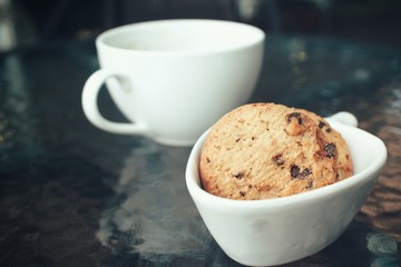 Hot coffee with chocolate cookies