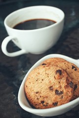 Hot coffee with chocolate cookies