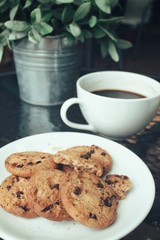 Hot coffee with chocolate cookies