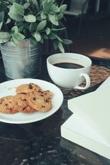 Hot coffee with chocolate cookies