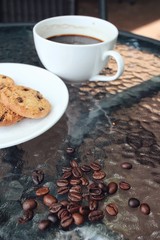 Hot coffee with chocolate cookies