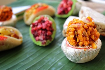 Indian sweets on banana leaf