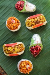 Indian sweets on banana leaf