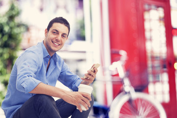 Man using mobile phone outdoor