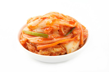 Kimchi (Korean food) close up on white background - obrazy, fototapety, plakaty