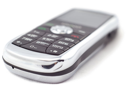 Photo silver mobile phone in refocuse