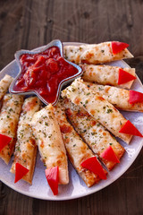 Cheesy Breadsticks Witch Fingers
