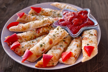 Cheesy Breadsticks Witch Fingers