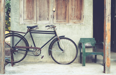 Fototapeta na wymiar Vintage bicycle in coffee house, retro instagram effect