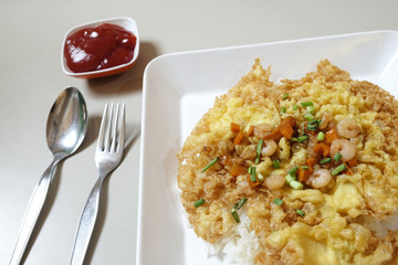 crispy omelet with shrimp and vegetable on top