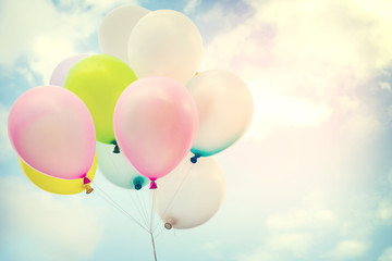 vintage colorful balloon on blue sky concept of love in summer and valentine, wedding honeymoon