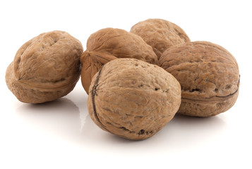 Walnuts on a white 
