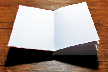 Fototapeta premium Blank book on wooden background