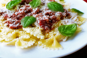 Pasta bolognese in white plate, closeup