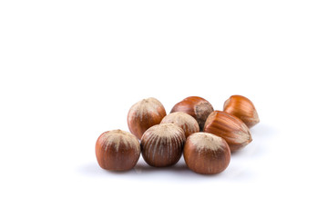 Hazelnuts on white