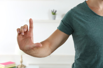 Young man push button