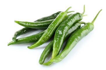 Green hot peppers isolated on white