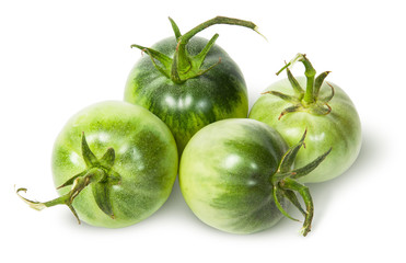 Four green tomatoes near