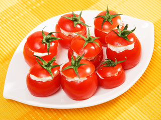 Stuffed cherry tomatoes with cheese cream