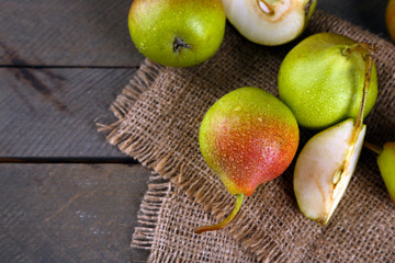 Ripe tasty pears on table close up
