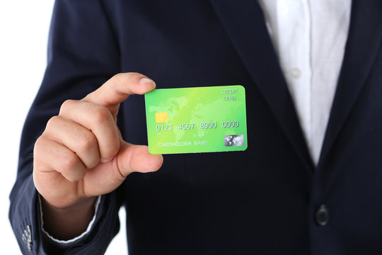 Businessman holding credit card,  close-up