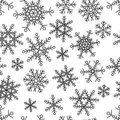 Hand drawn vector seamless pattern with black snowflakes 