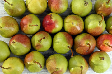 Heap of fresh ripe pears close up