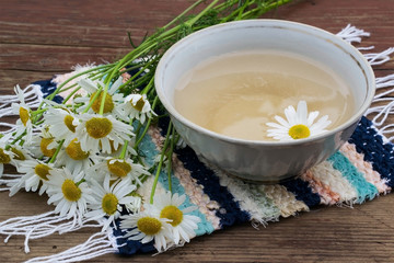 Obraz na płótnie Canvas Useful herbal tea with chamomile