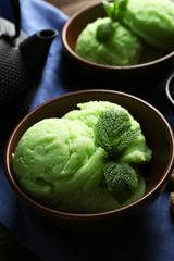 Homemade Green tea ice-cream on dark wooden background