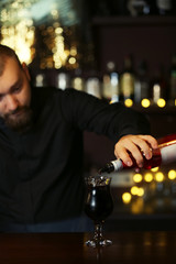 Bartender making cocktail