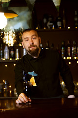 Bartender making cocktail