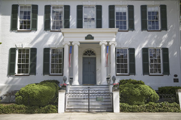 Green shutters on a white house in Pocomoke City, the Eastern Shore of Maryland