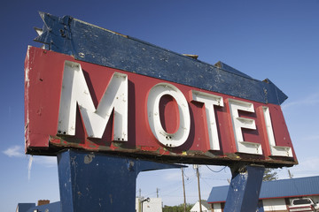 Deserted motel sign rotting away on Route 13 on the Eastern Shore of Maryland