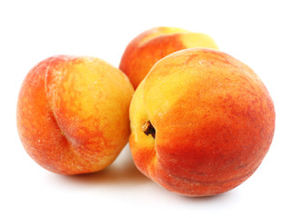 Fototapeta na wymiar Ripe peaches isolated on white