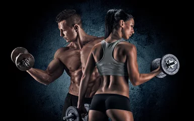 Foto auf Acrylglas Fitness Athletischer Mann und Frau mit Hanteln.