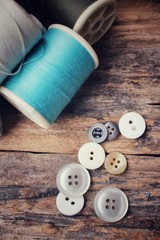Bobbins colorful threads with sewing buttons