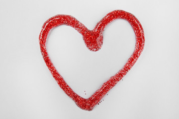 Painted heart on white paper background