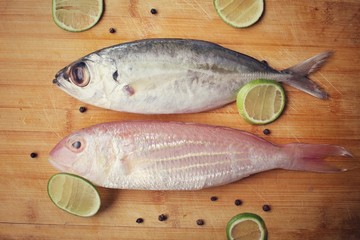 Fresh raw fish ,lemon and pepper