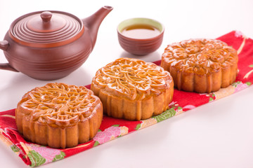 Mooncakes. Traditional Mooncake and hot tea - Chinese cake