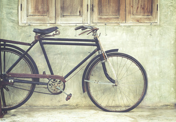 Fototapeta na wymiar Vintage bicycle in coffee house, film look instagram effect