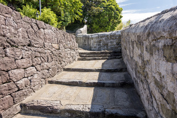 Fototapeta na wymiar 平戸島のオランダ塀と石段