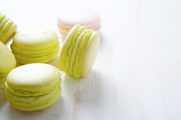 Tasty macaroons on white boards