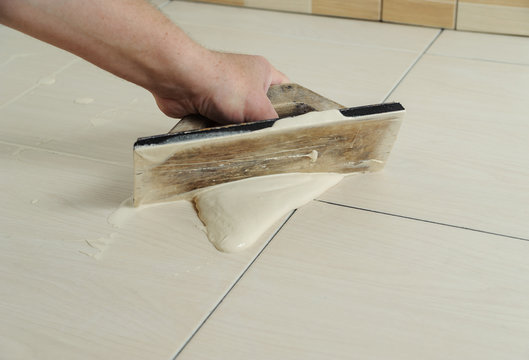 Fill The Tile Joints With Grout