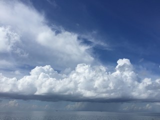 Naklejka na ściany i meble Clouds over tropical ocean