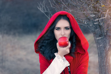 Red Hooded Woman Holding Apple Fairytale Portrait © nicoletaionescu