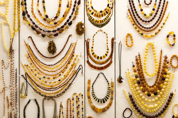 The variety of colorful  amber necklaces.