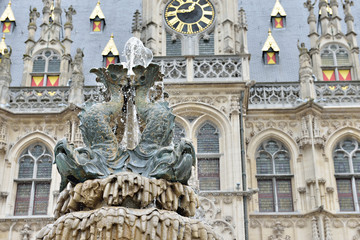 Medieval fountain on front of city hall of Oudenaarde, Belgium - 90223812
