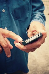 Man using smart phone