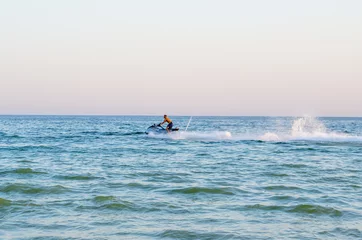 Foto op Canvas Man op jetski drijvend in zee © boxerx
