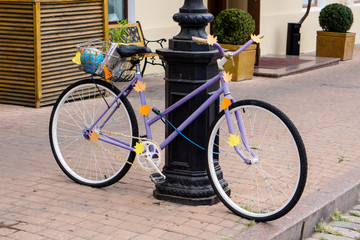 Fototapeta na wymiar Decorated purple bicycle 